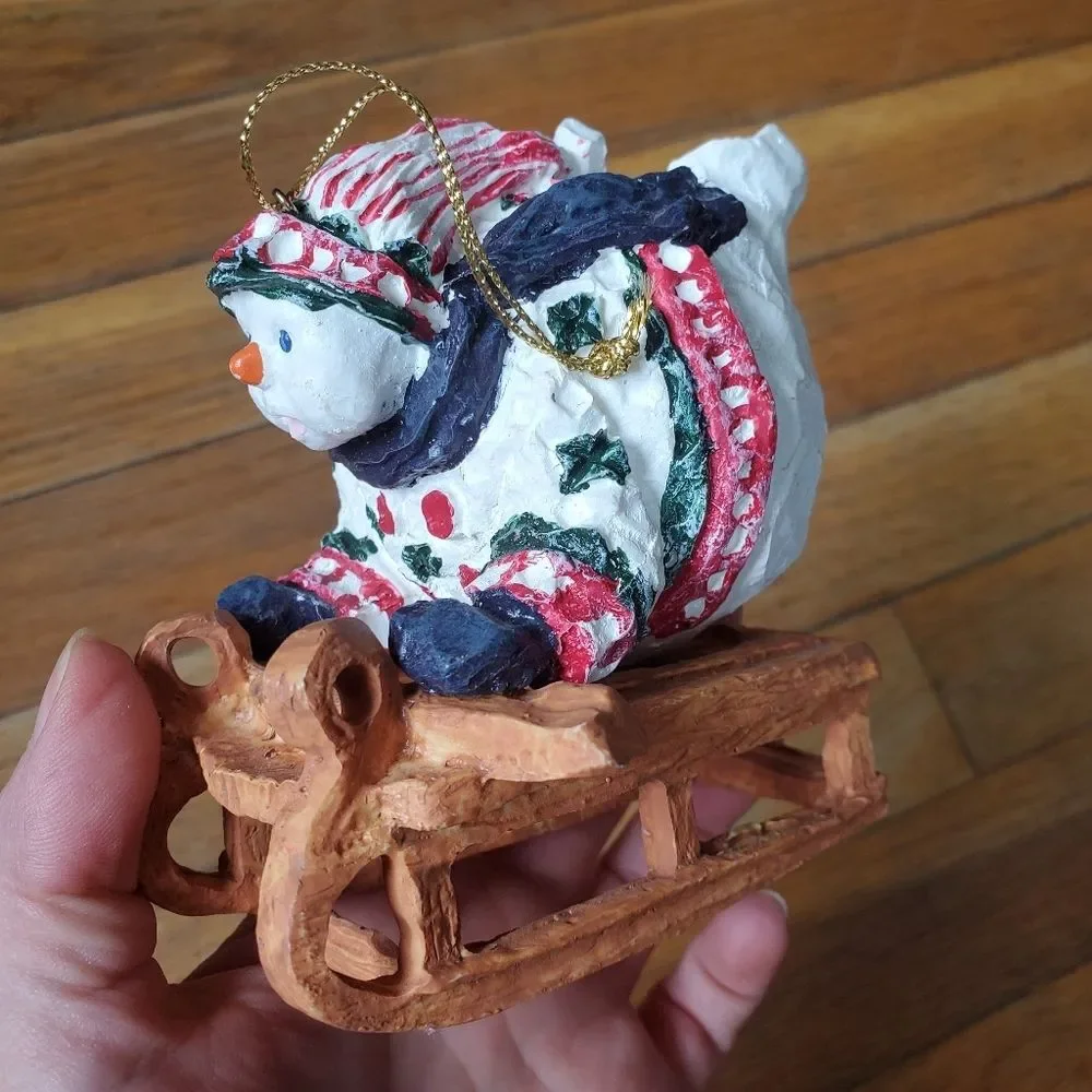 Round large snowman on sled Christmas tree ornament‎